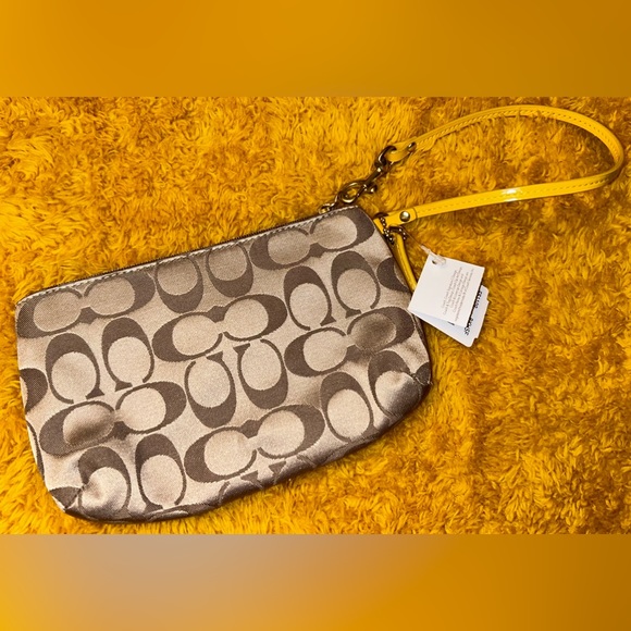 NWT Coach Monogram Sunflower Wristlet